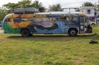 The RV lifestyle in Puerto Morales. Looks like an old school bus conversion in the a psychedelic style of the 60's