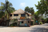 a 2 story beach side hotel on tulum road, There are new luxury hotels in towm but no high rises allowed. The limit is around 2 or 3 stories.