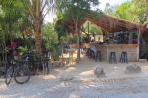 On the jungle side of Tulum Road is this popular restaurant serving mexican food with a mediterrian twist