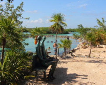 this park has a variety of sculptures to see as you walk along a path around the lagoon