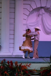 Folk dancing on stage in the main plaza