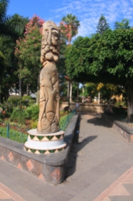 a stone sculpture at another corner of the plaza